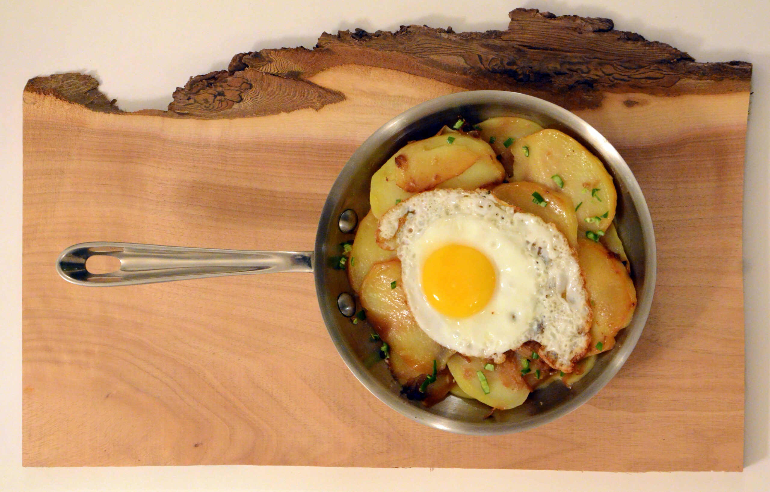 Potatoes topped with eggs