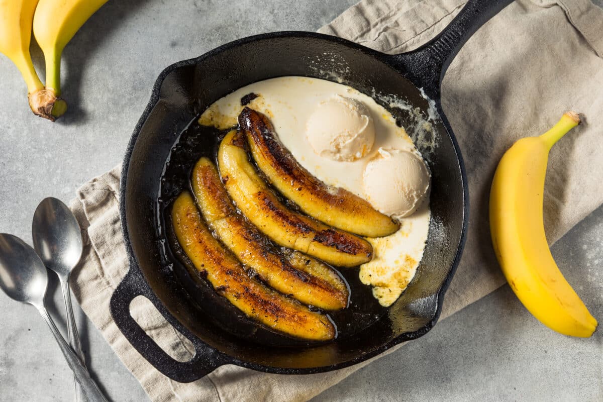 Skillet with bananas foster with ice cream
