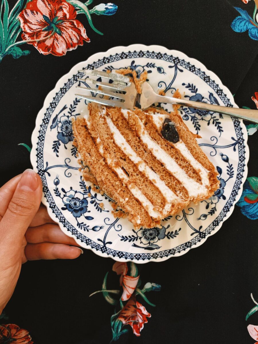 Slice of Ukrainian Honey Cake on a flowered plate