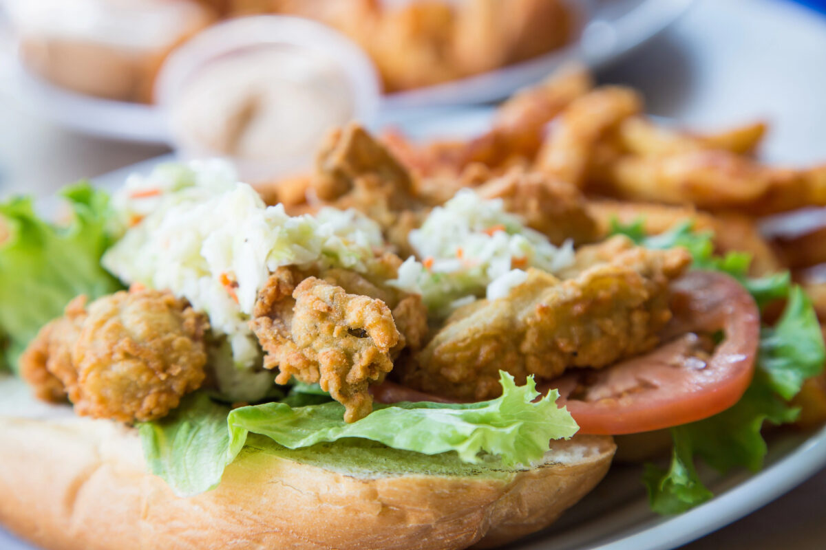 Oyster po'boy with batter fried oysters on a roll with cole slaw