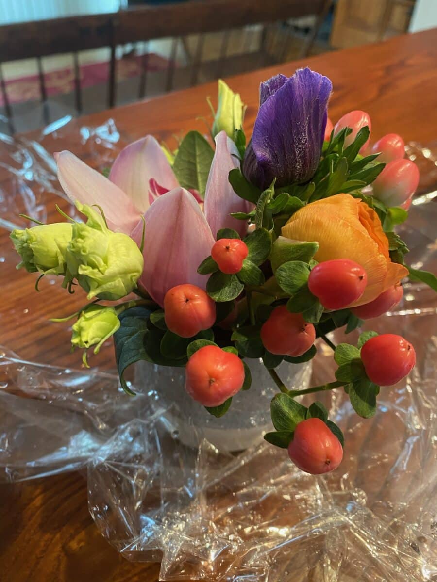 BOwl of flowers on a table