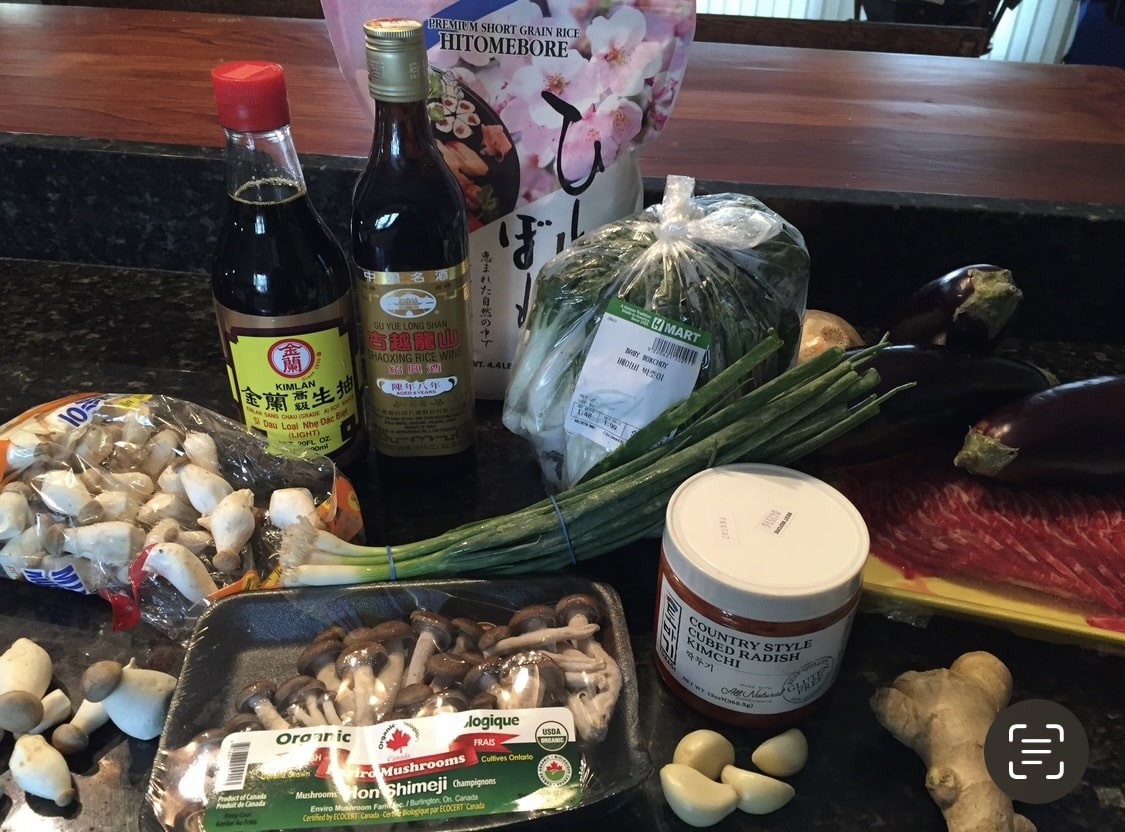Assorted Asian groceries displayed on a kitchen counter.