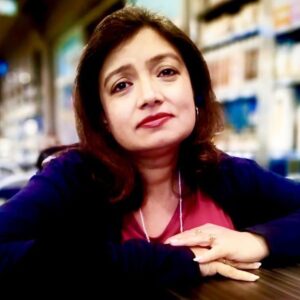 Portrait of Ayesha Said in a store setting