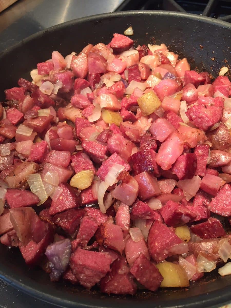 Freshly cooked buffalo hash with diced potatoes, onions, and buffalo sausage.