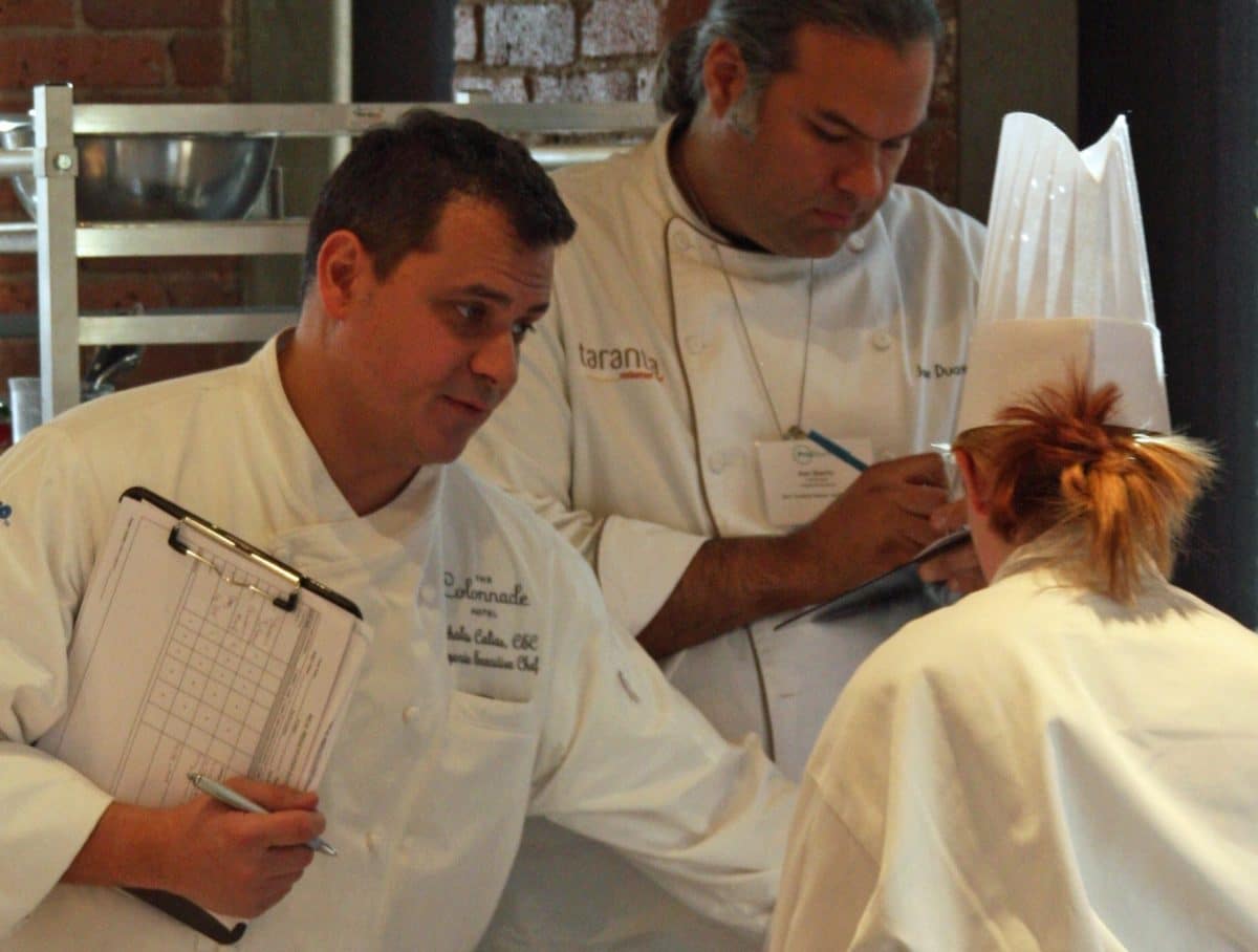 Chef Nick Calias discussing with a culinary student