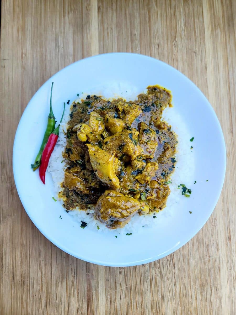 Biryani Dish with spiced chicken over rice