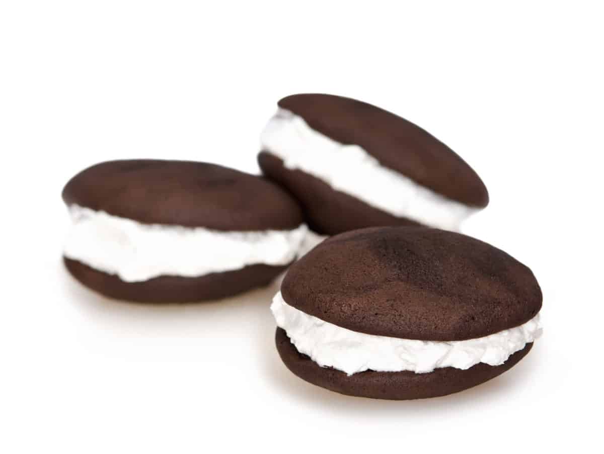 Three chocolate whoopie pies with cream filling