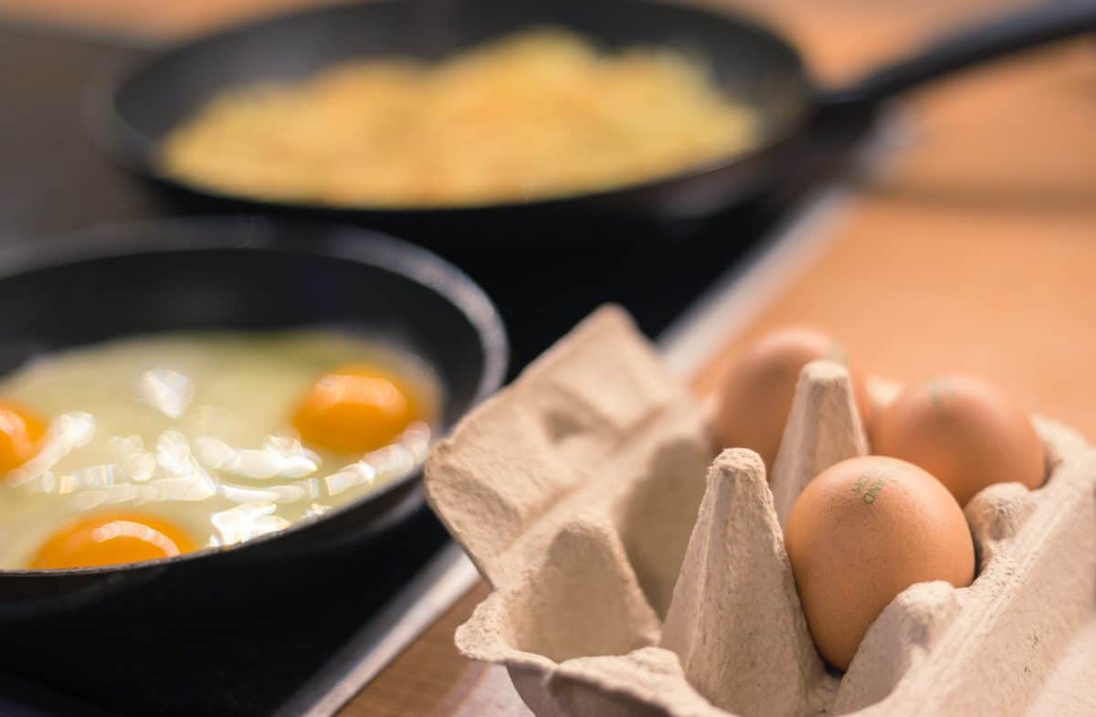 Eggs being fried in a pan
