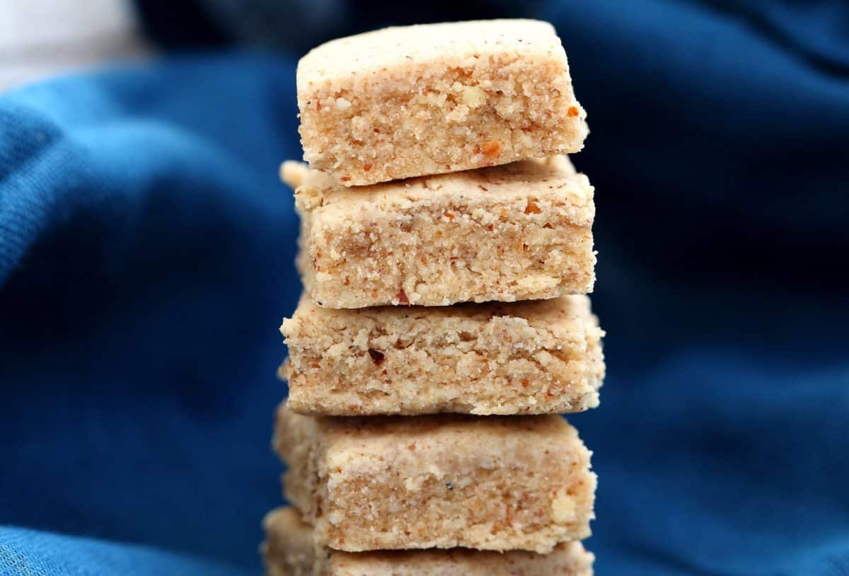 Stacked vegan kalakand squares with a rich texture