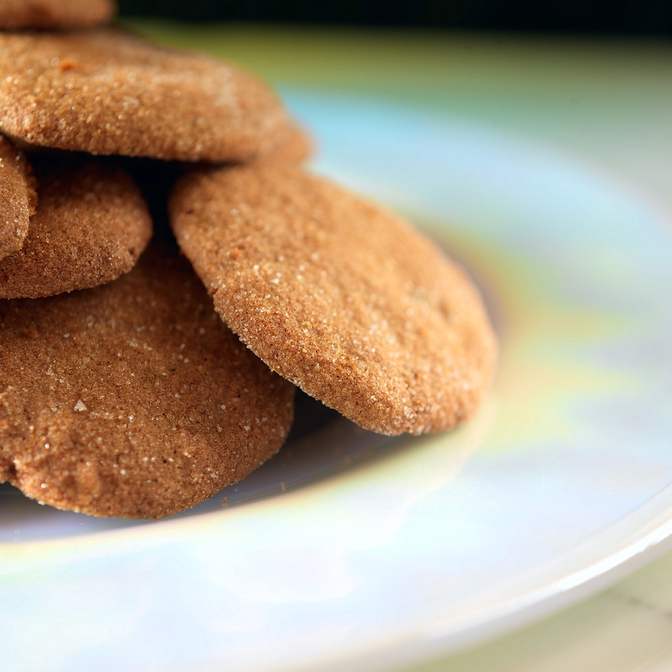 Close-up of snappy ginger cookies with a light sugary coating