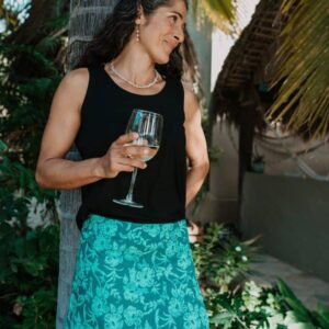 Woman wearing a RipSkirt in Hibiscus Green