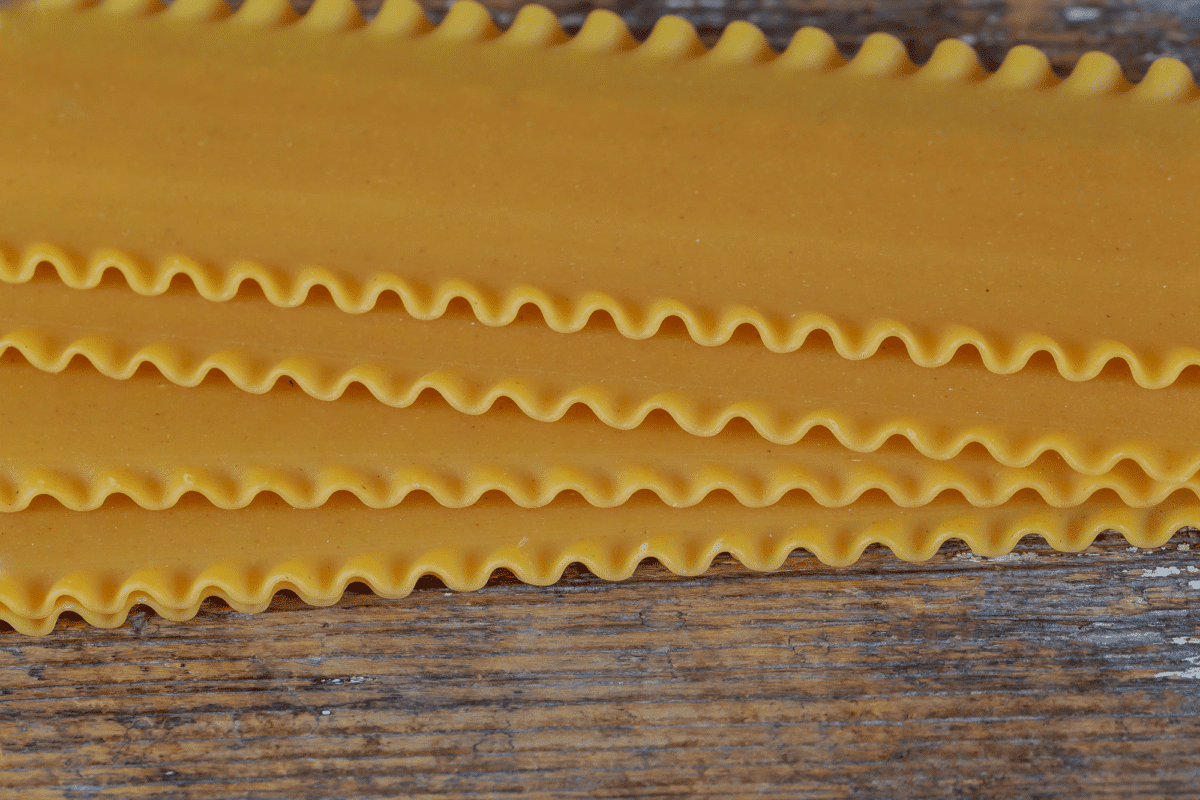 Close-up of lasagna noodles on a wooden surface