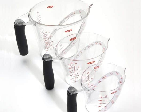 A set of three clear Oxo angled measuring cups with black handles