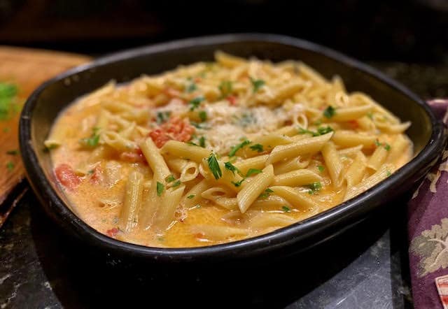 Bowl of penne pasta in a creamy vodka sauce