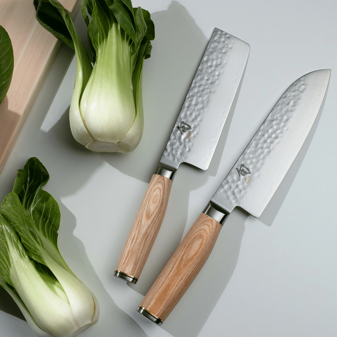 Premier Blonde Nakiri and Santoku knives next to Bok Choy