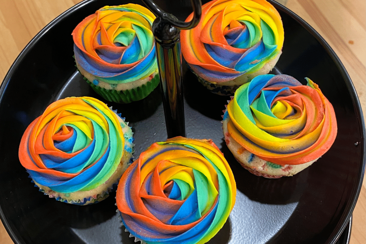 Vibrant rainbow-colored cupcakes