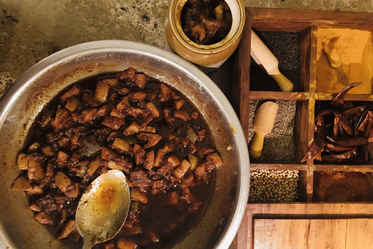 Overhead view of Indian lemon/lime pickle preparation.
