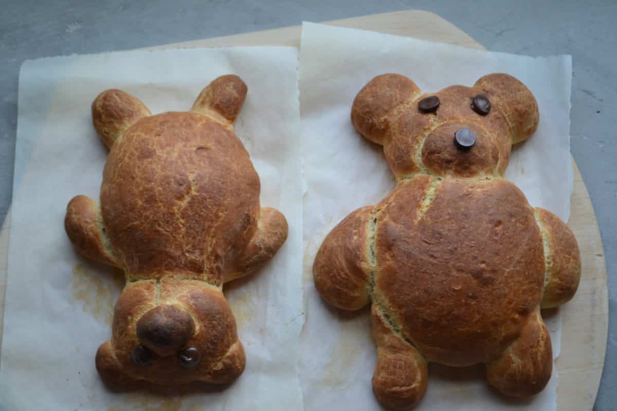Shaped teddy bear breads before baking