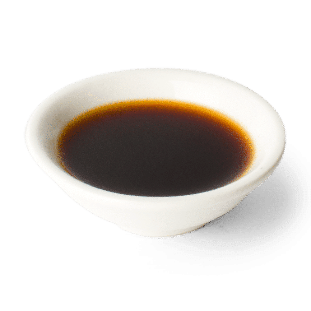 Close-up of soy sauce in a small white bowl