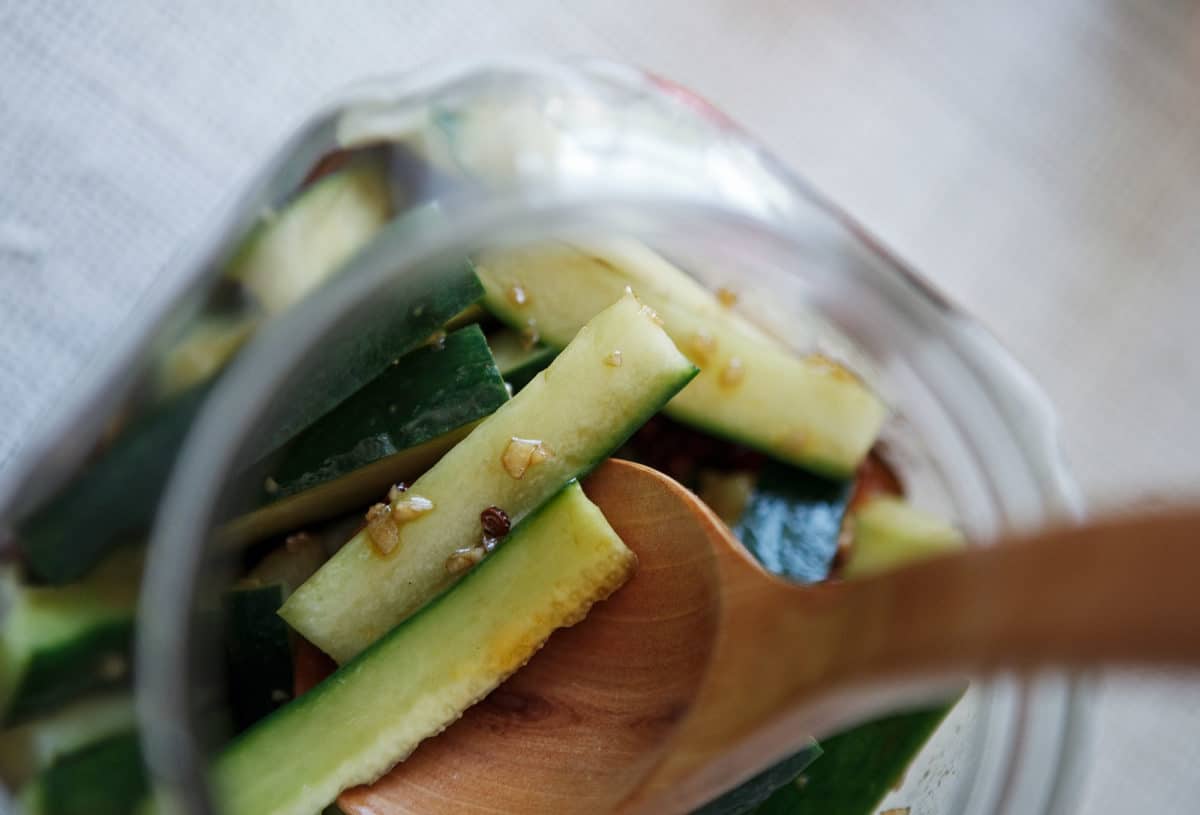 Sliced cucumbers with Sichuan peppercorn marinade.