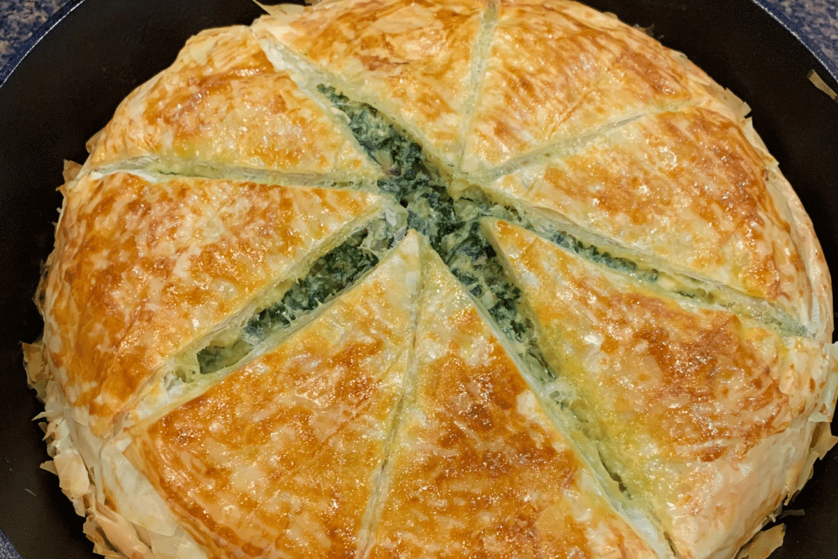 Freshly baked spinach pie in a skillet