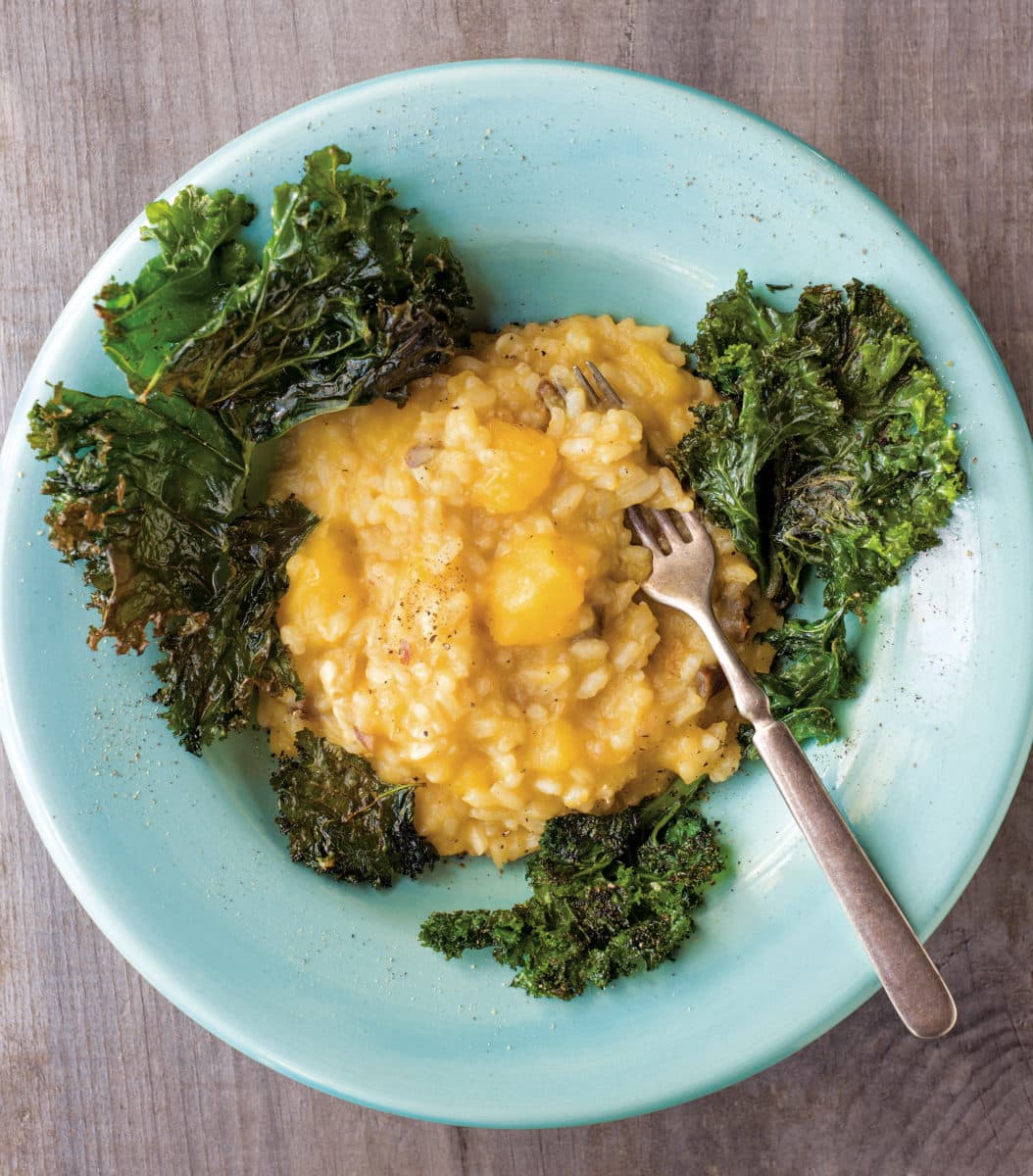 Delicious squash risotto served with roasted kale. Photo by Stacy Cramp