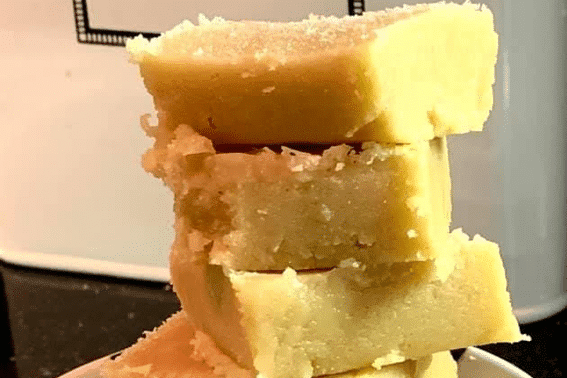 Stacked pieces of creamy peanut butter fudge
