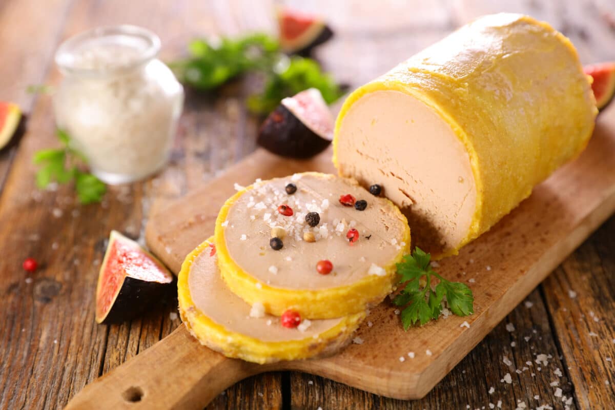 Torchon de foie gras on a wooden board