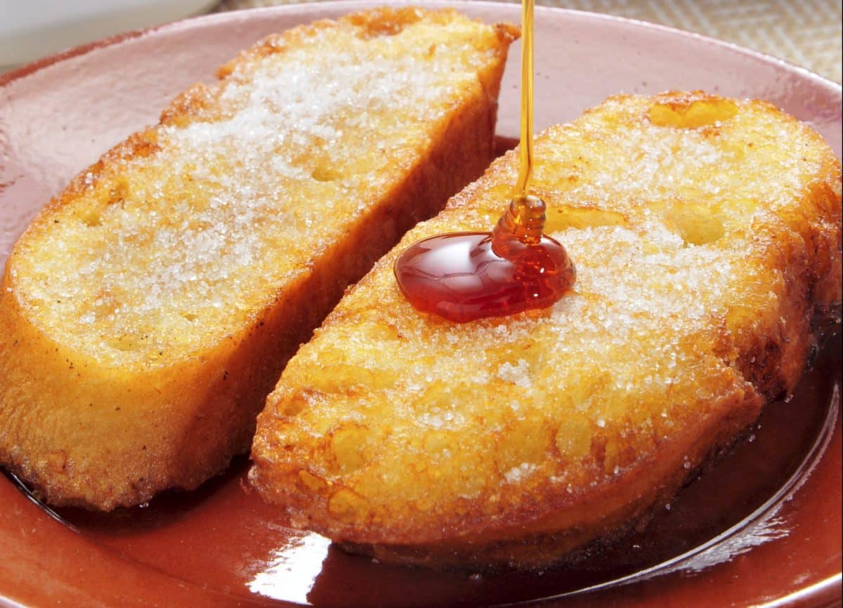 Close-up of Torrijas, a typical Spanish dessert for Lent and Easter with honey drizzle.
