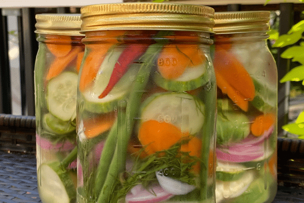 Jar of colorful pickled vegetables