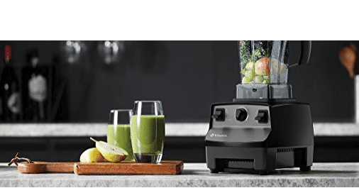 Vitamix 5200 blender with two green smoothies.