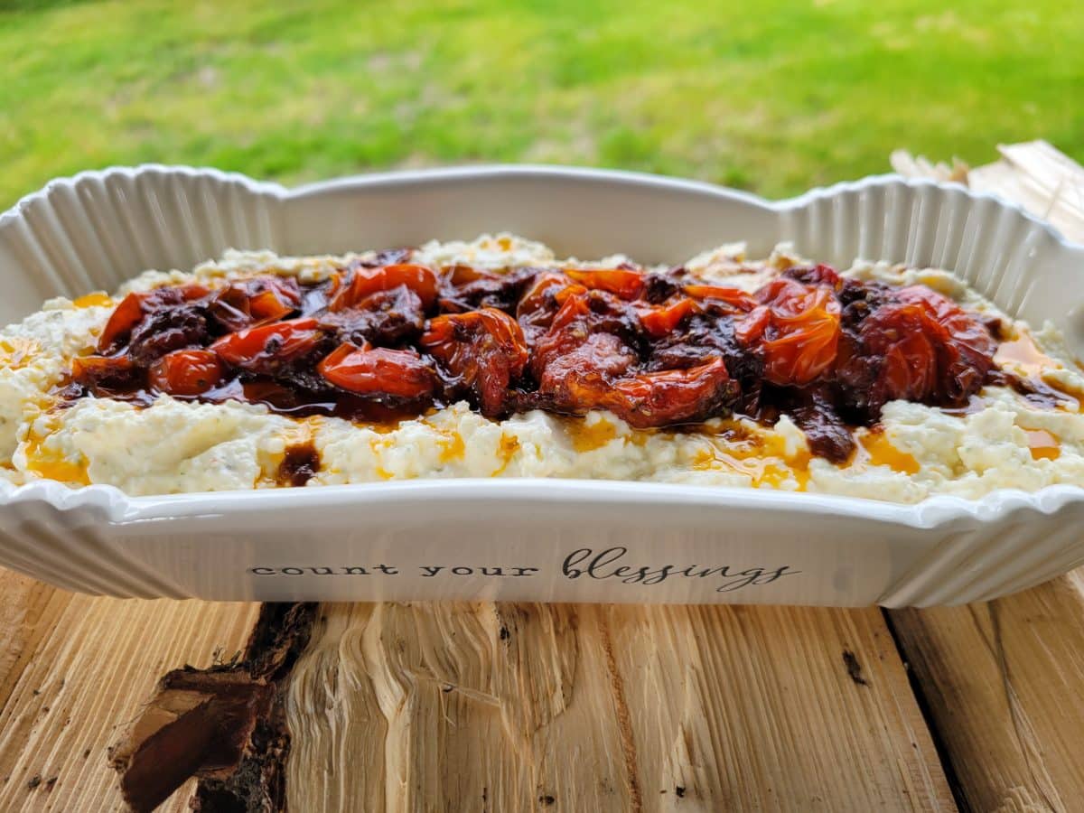 Creamy whipped feta topped with roasted marinated tomatoes